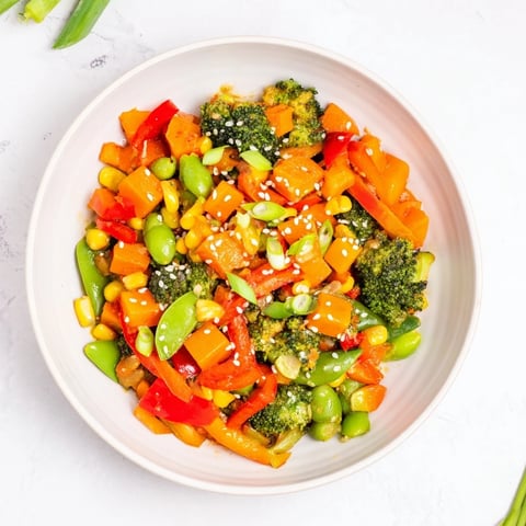 Colorful Vegetable Stir-Fry, with vibrant frozen vegetables coated in a savory sauce, ready for serving.