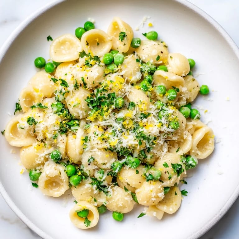 Delicious garlic butter ditalini pasta, ready to serve with extra Parmesan cheese sprinkled on top.