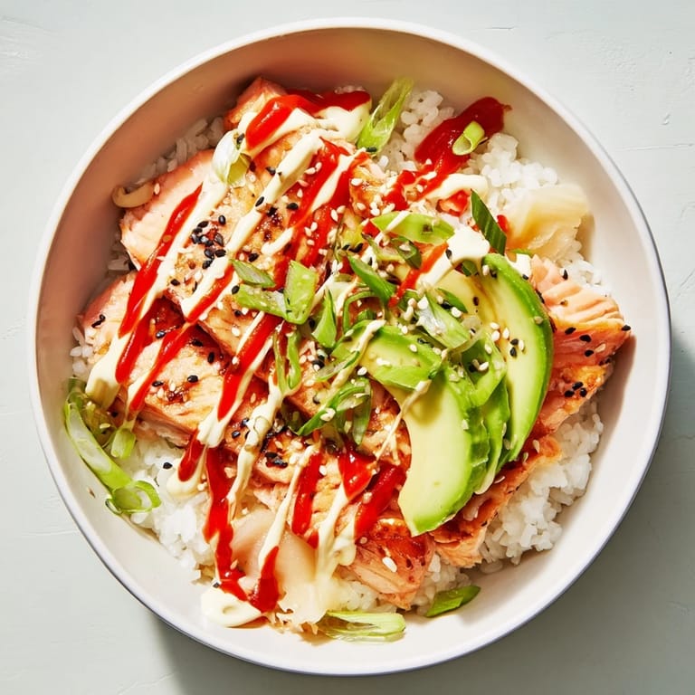 A comforting bowl of Classic Salmon Rice, featuring delicious flaked salmon and savory rice, ready to enjoy.