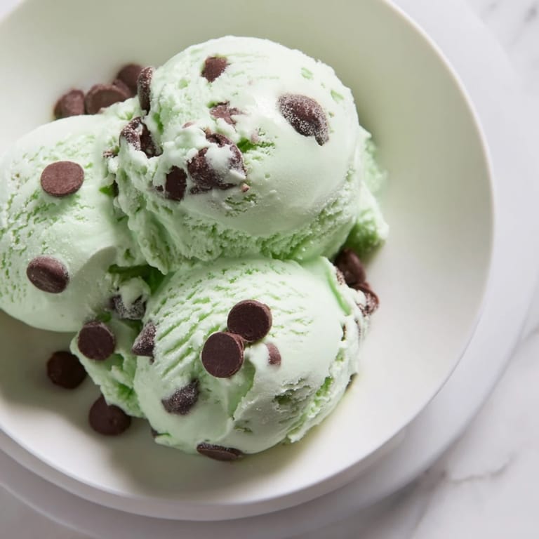 Fresh mint and chocolate chips combine in this easy-to-make mint chocolate chip ice cream recipe.